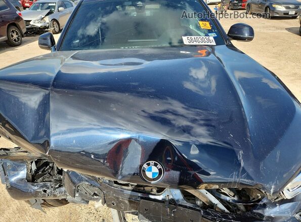 5UXCY6C01N9L58858 2022 BMW X6 Blue Widok wnętrza z tyłu