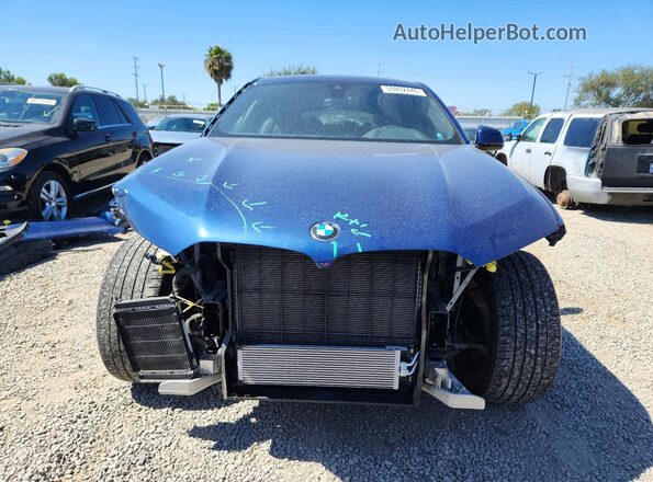 5UXCY6C01N9M19626 2022 BMW X6 Blue Front view