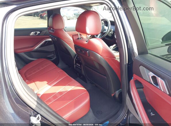 5UXCY6C06M9E93643 2021 BMW X6 Black VIN კოდის სტიკერის ხედი