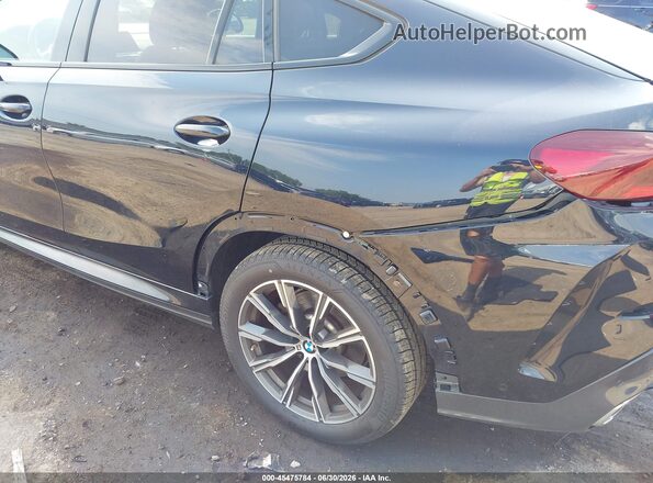 5UXCY6C06M9E93643 2021 BMW X6 Black წინა ხედი