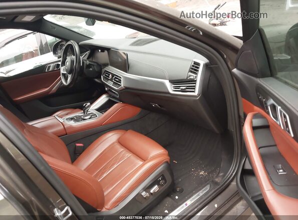5UXCY6C07P9N47002 2023 BMW X6 Green Вид салону спереду