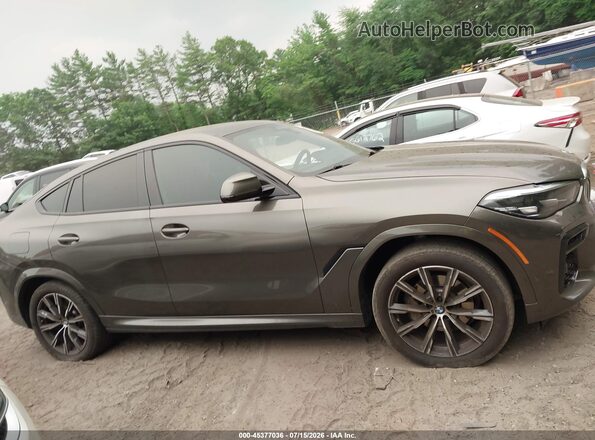 5UXCY6C07P9N47002 2023 BMW X6 Green Вид панелі приладів