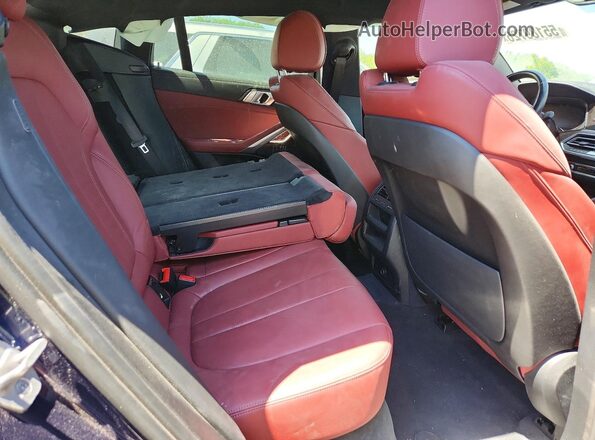 5UXCY6C08N9K30133 2022 BMW X6 Blue Rear interior view