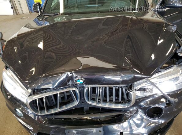 5UXKR0C36H0V80966 2017 BMW X5 Black Vista del compartimento del motor