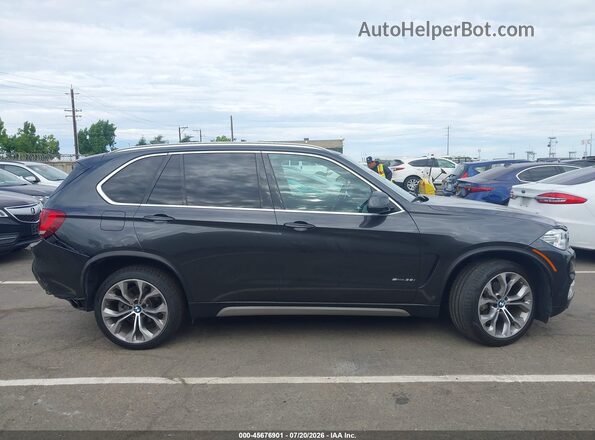 5UXKR2C56J0Z22483 2018 BMW X5 Black Вид задньої частини салону