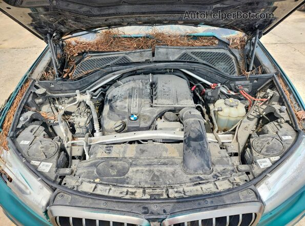 5UXKU0C52J0G69717 2018 BMW X6 Turquoise Սալոնի հետևի տեսք
