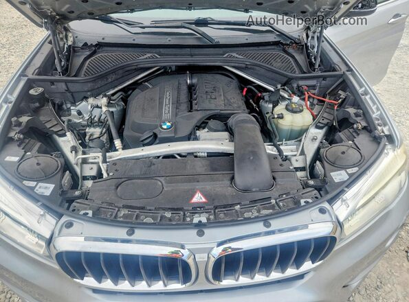 5UXKU0C53G0F92607 2016 BMW X6 Gray Rear interior view