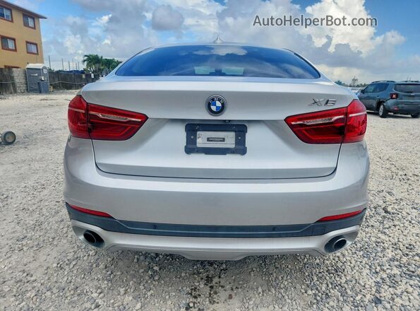 5UXKU0C53G0F92607 2016 BMW X6 Gray Rear view