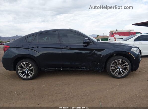 5UXKU0C54J0G80489 2018 BMW X6 Dark Blue Rear interior view