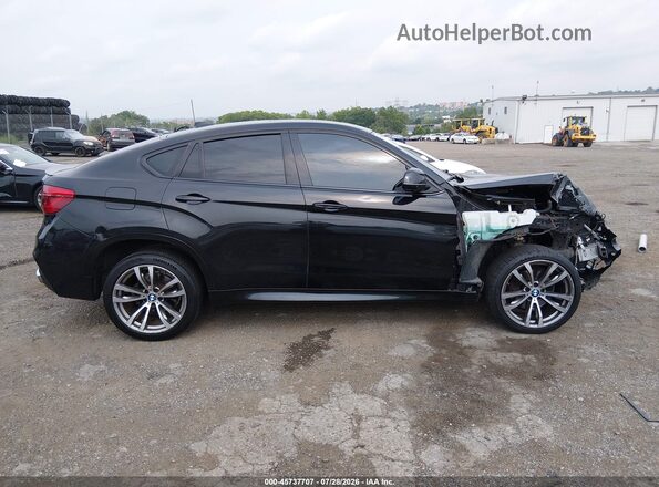 5UXKU0C5XG0F93415 2016 BMW X6 Black Вид задньої частини салону