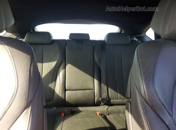 5UXKU2C53G0N80210 2016 BMW X6 Black Հետևի նստատեղերի տեսք
