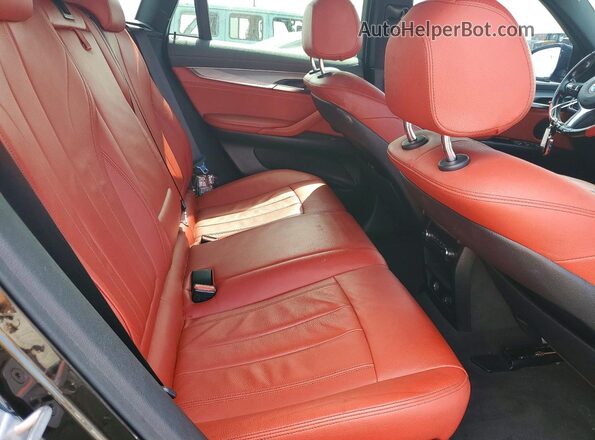5UXKU2C53G0N82054 2016 BMW X6 Black Vista de los asientos traseros
