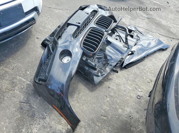 5UXKU2C53G0N82054 2016 BMW X6 Black Vista del compartimento del motor