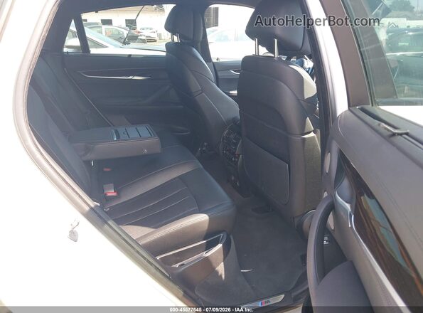 5UXKU2C59H0N84649 2017 BMW X6 White VIN կոդի պիտակի տեսք