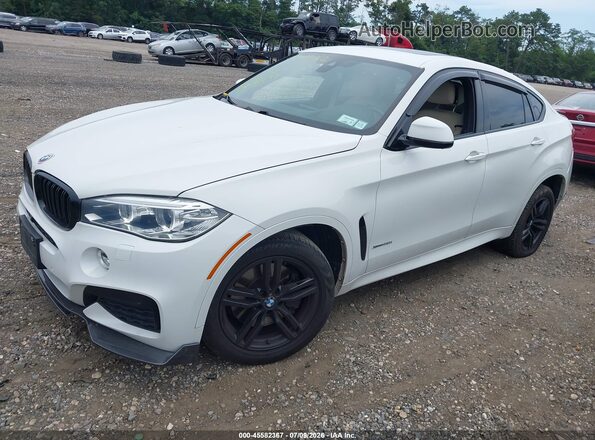 5UXKU6C33H0W38713 2017 BMW X6 White წინა მარცხენა ხედი სამი მეოთხედიდან