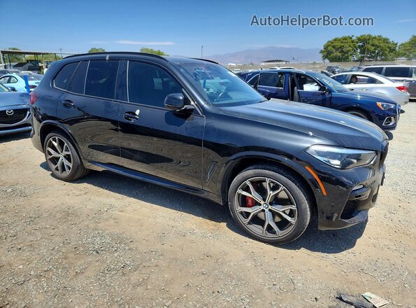 5UXTA6C05M9E28447 2021 BMW X5 Black Przód prawy