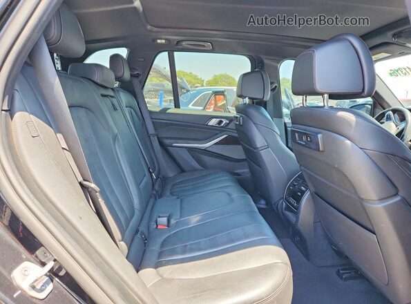 5UXTA6C05M9E28447 2021 BMW X5 Black Widok wnętrza z tyłu