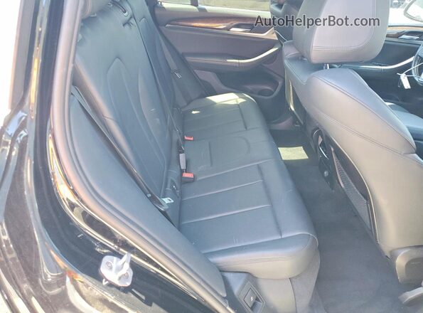 5UXTR7C53KLF34499 2019 BMW X3 Black Vista interior trasera