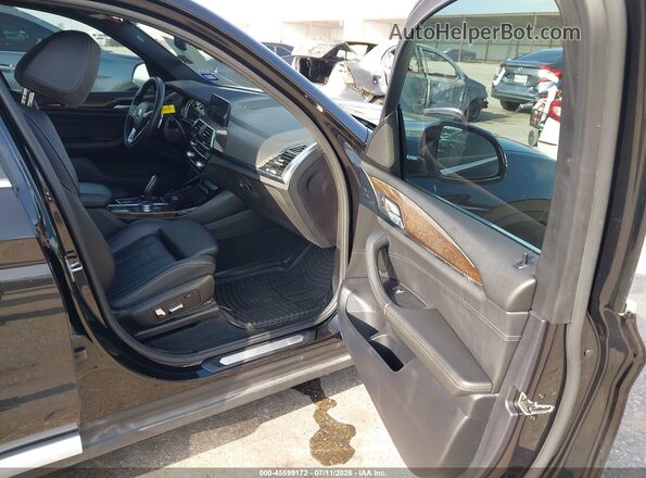 5UXTR7C56KLE96282 2019 BMW X3 Black Front interior view