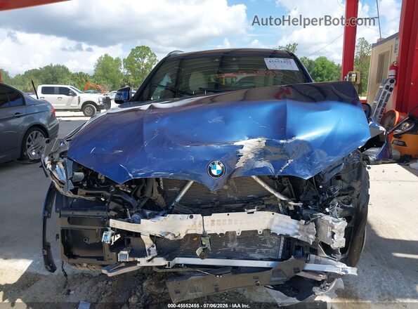5UXTR7C58KLF30531 2019 BMW X3 Blue Սալոնի հետևի տեսք