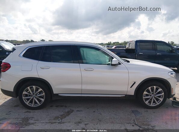 5UXTR7C5XKLR50305 2019 BMW X3 White Widok wnętrza z tyłu