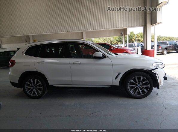 5UXTR9C52KLE12969 2019 BMW X3 White Widok wnętrza z tyłu