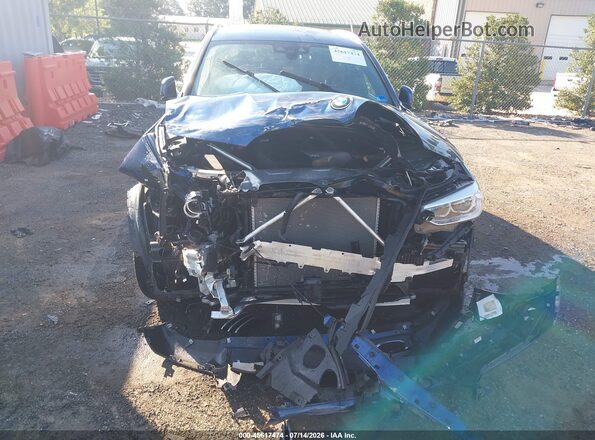 5UXTR9C52KLE14284 2019 BMW X3 Blue Vista interior trasera