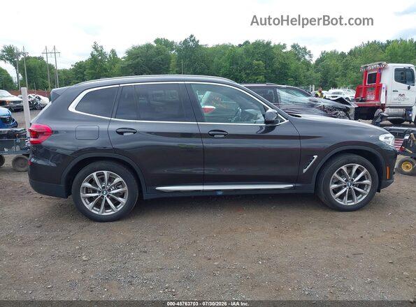 5UXTR9C54KLP89056 2019 BMW X3 Black Vista interior trasera