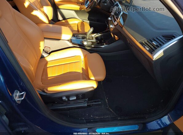 5UXTS1C0XM9F52598 2021 BMW X3 Blue Front interior view