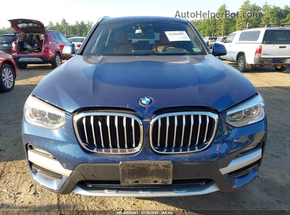 5UXTS1C0XM9F52598 2021 BMW X3 Blue Rear interior view
