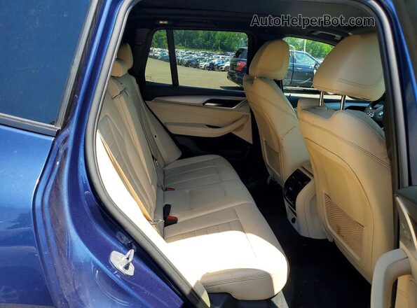 5UXTS3C59J0Y94452 2018 BMW X3 Blue Rear interior view
