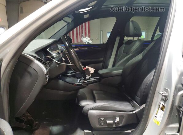 5UXTY3C02M9F52072 2021 BMW X3 Silver Front interior view