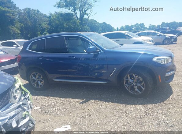 5UXTY3C02M9H33124 2021 BMW X3 Синий Вид задней части салона