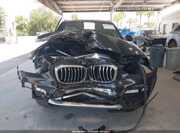 5UXTY3C02M9H99043 2021 BMW X3 Black Սալոնի հետևի տեսք