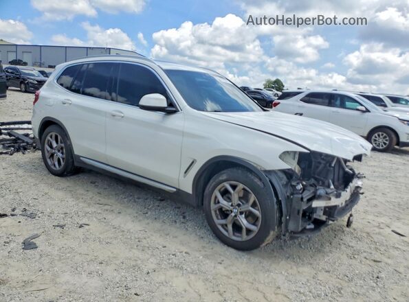5UXTY3C06L9C71505 2020 BMW X3 White Front right