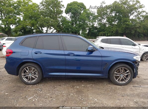 5UXTY3C06M9F37638 2021 BMW X3 Blue Rear interior view