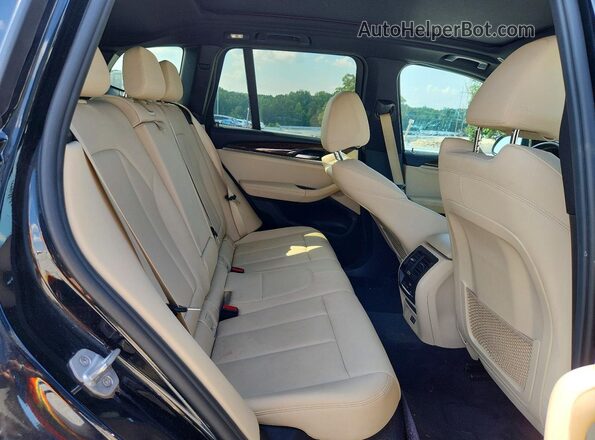 5UXTY3C0XLLE54828 2020 BMW X3 Black Widok wnętrza z tyłu
