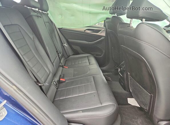 5UXTY5C02M9D97096 2021 BMW X3 Blue Rear seats view