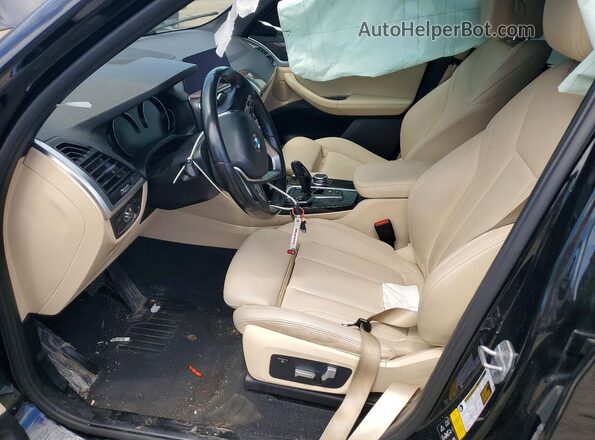 5UXTY5C02M9G79464 2021 BMW X3 Blue Front interior view