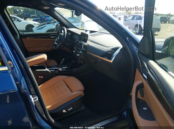 5UXTY5C04M9F21496 2021 BMW X3 Blue Vista interior delantera