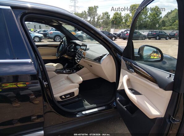 5UXTY5C07L9C62565 2020 BMW X3 Black Front interior view