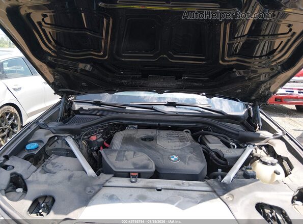 5UXTY5C07L9C62565 2020 BMW X3 Black Rear view