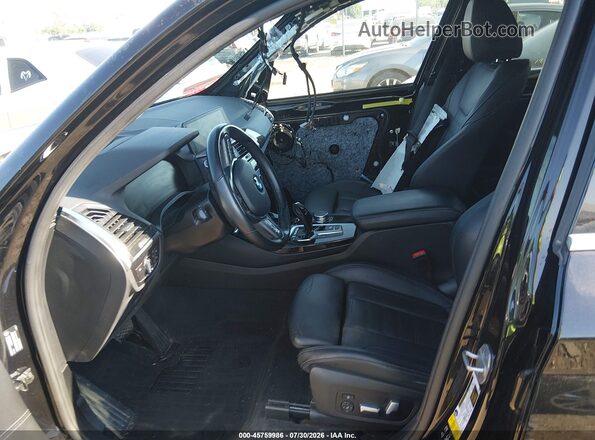 5UXTY5C0XM9F25875 2021 BMW X3 Black Front interior view