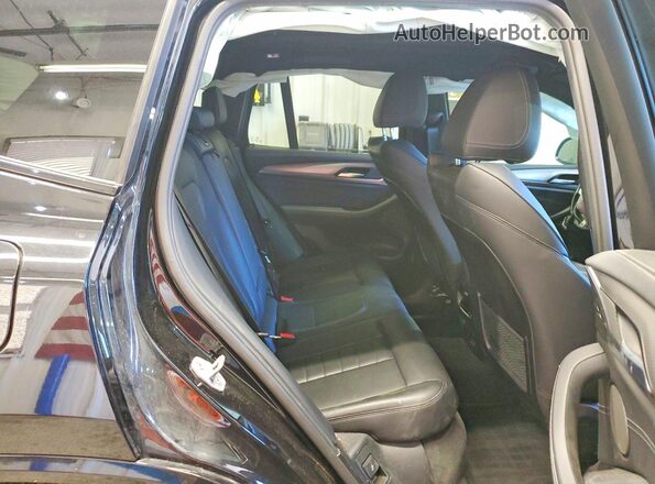 5UXTY9C00L9D35265 2020 BMW X3 Black Вид задньої частини салону