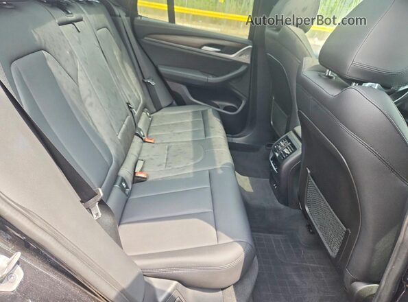 5UXTY9C01M9E65718 2021 BMW X3 Black Vista de los asientos traseros