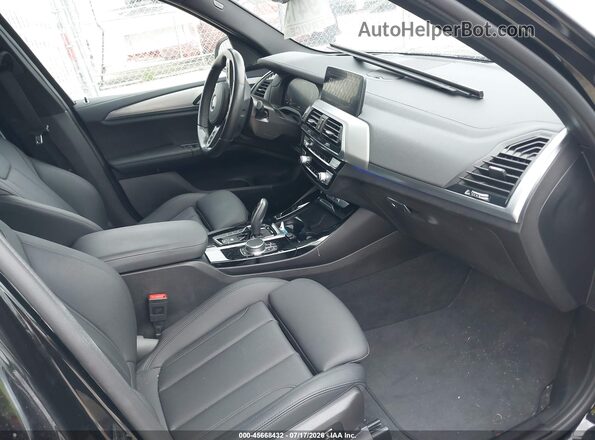 5UXTY9C02M9E91079 2021 BMW X3 Black Widok wnętrza z przodu