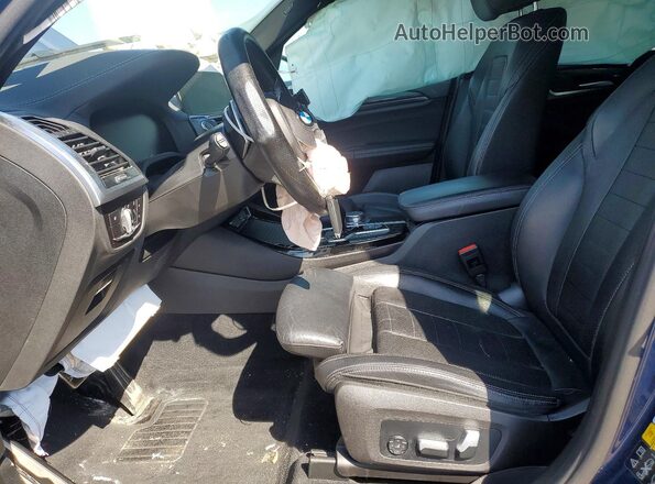 5UXTY9C06M9F80038 2021 BMW X3 Blue Вид салону спереду