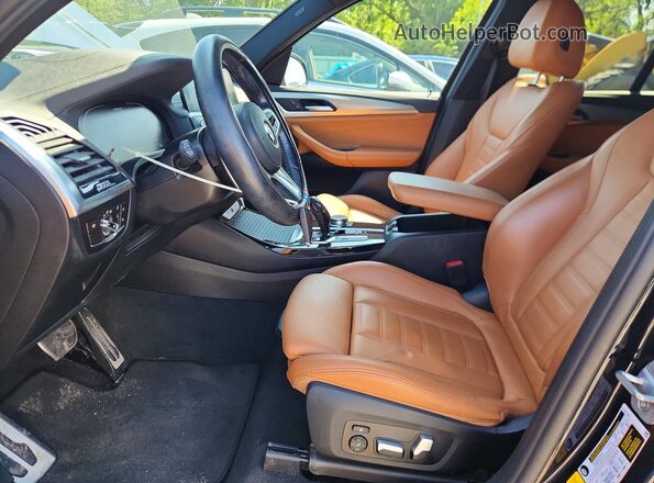 5UXTY9C09M9E10174 2021 BMW X3 Black Widok wnętrza z przodu