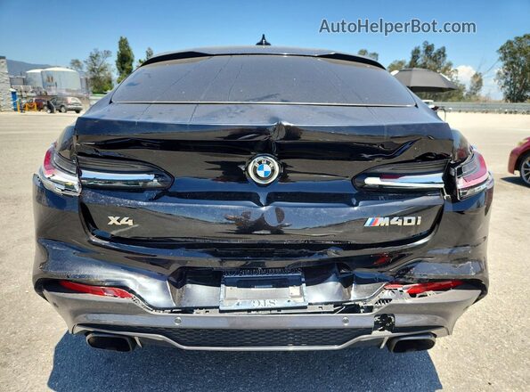 5UXUJ5C50KLJ64402 2019 BMW X4 Черный Вид сзади