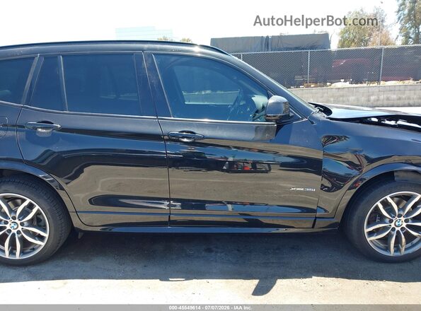 5UXWX7C52H0U39779 2017 BMW X3 Черный Вид задней части салона